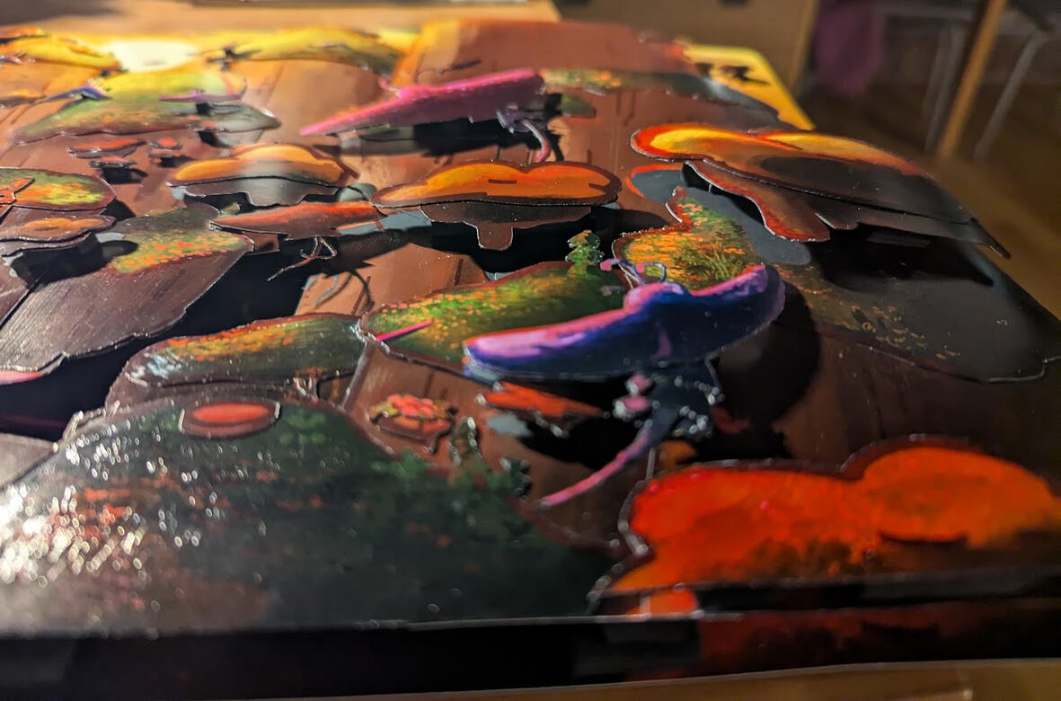 closeup of the shadowbox element of Cosmic and the Great Mantatail Migration.