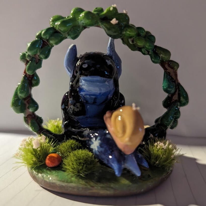 small 4 inch figurine painted with acrylic and coated in UV resin